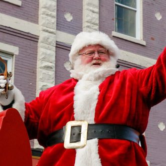 Santa’s Sleigh Makes His Way Downtown