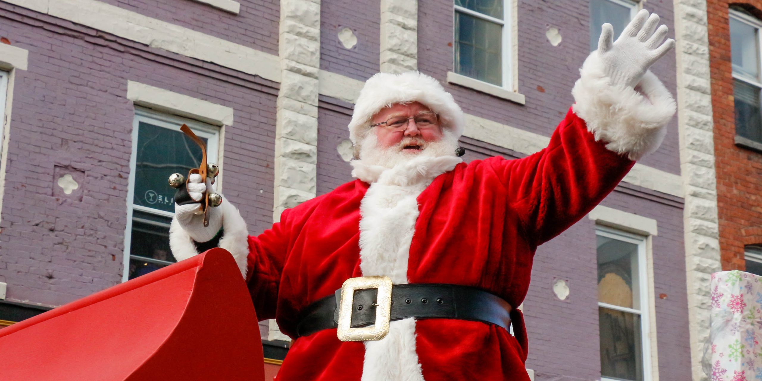Santa’s Sleigh Makes His Way Downtown
